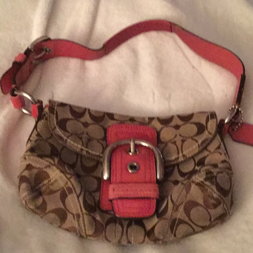 Gently love Coach bag with brown trademark fabric